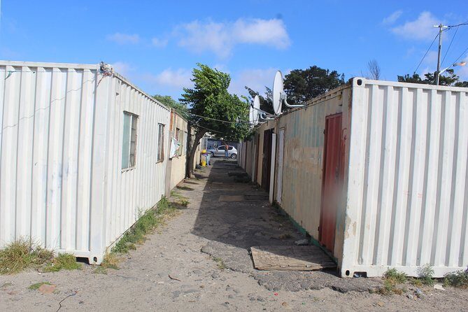 African Township And Cultural Tour - Langa from Cape Town Half Day - Hostels, Sports-School Walk-By Stops, and Apartheid-Era Context