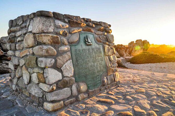 Cape Agulhas Full-Day Private Tour & Wine Tasting from Cape Town - Hermanus coast stop: cliffs, shops, and whale-season chances