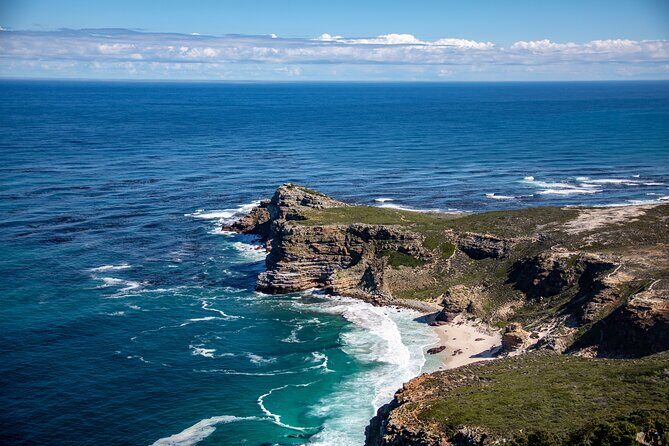 Cape of Good Hope and Boulders Beach Group Tour in Cape Town - Maidens’ Cove: the ocean-and-mountains photo pause