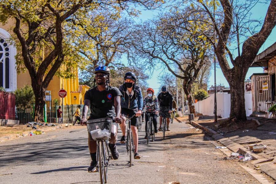 Cape Town: bicycle or E-scooter History Tour with Coffee - St Georges Mall: Cathedral views and a piece of the Berlin Wall