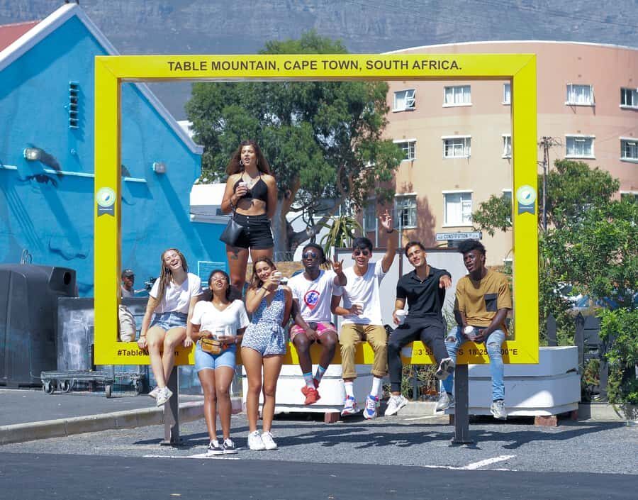 Cape Town: District Six Coffee & Culture Guided Walking Tour - The Yellow Table Mountain Frame Photo Moment (with Mandela in the Background)