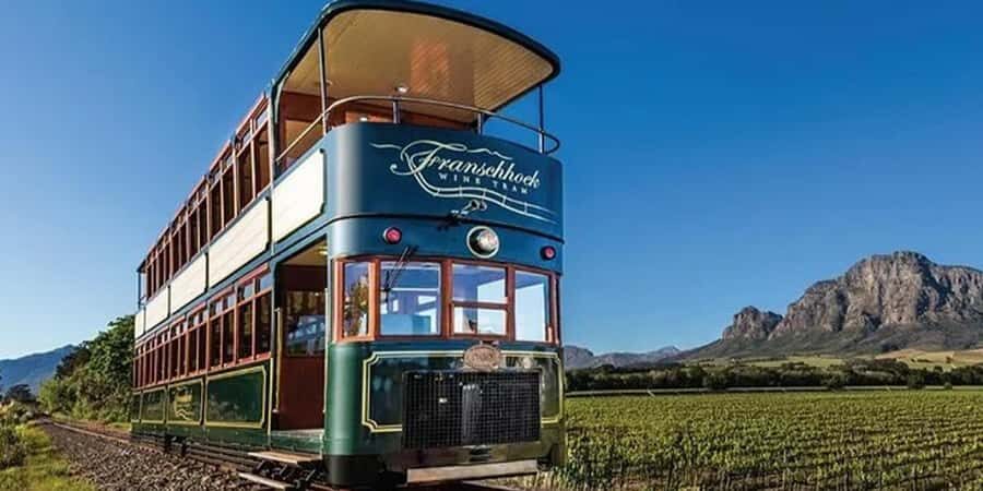 Cape Town: Franschhoek Wine Tram Hop-On Hop-Off Tour - The Tram Ride Through the Winelands: Your Moving Viewing Platform