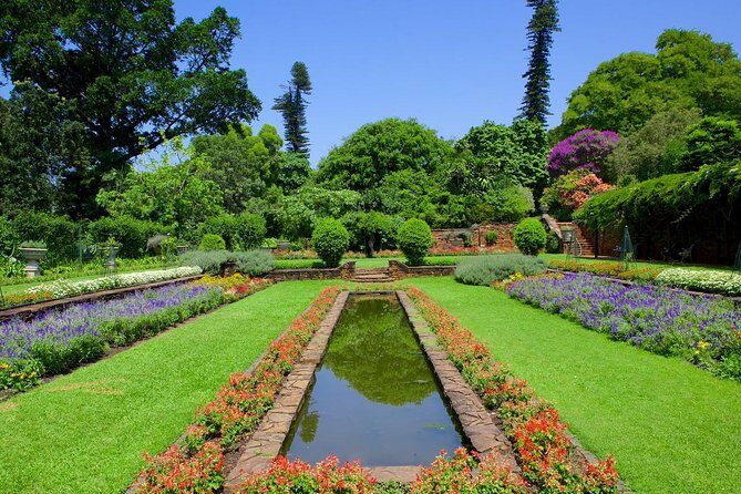Durban City & PheZulu Cultural Village Day Tour from Durban - Durban morning start: meeting point, pickup, and what the coach day feels like