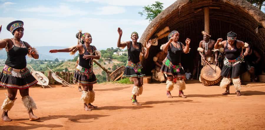 Durban: Phezulu Cultural Village & Reptile Park Tour - Crocodile and snake park: facts plus a real hands-on python moment