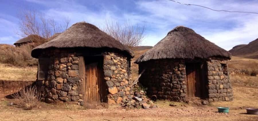 Durban: Tala Game Reserve, Phezulu Park, & Market Tour - Phezulu Safari Park: Zulu village learning that includes performance