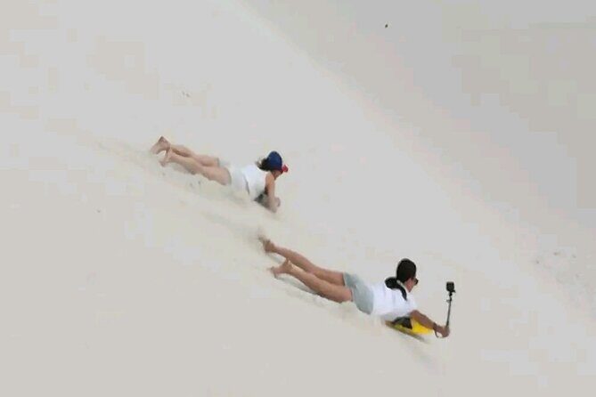 Explore Atlantis Sand Dunes with a 1hour 30mins sandboarding tour - Waxed Boards, Drinks, and Shade: What You Actually Get