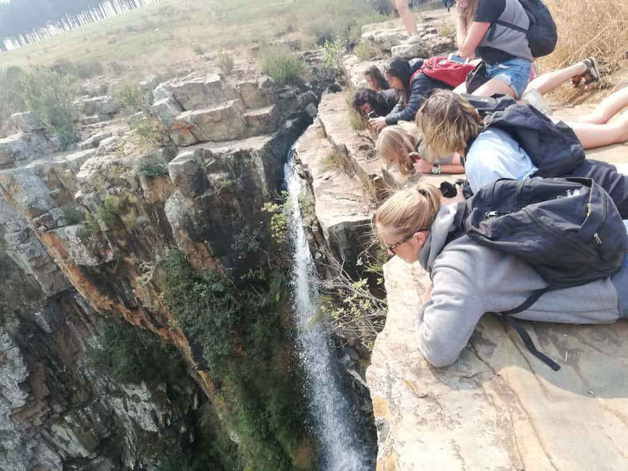 From Hoedspruit: Full Day Panorama Route Tour - Lisbon Falls near Graskop: water that turns the day from cliffs to motion