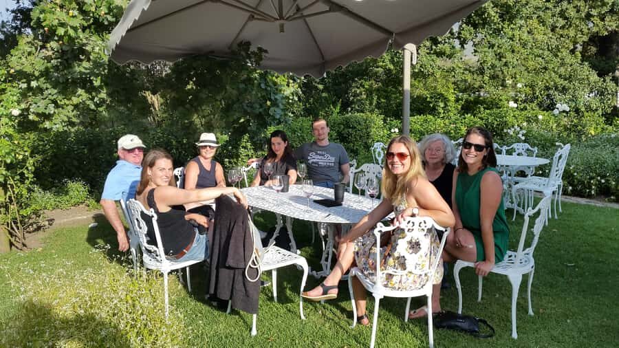 From Stellenbosch: Hop-On Hop-Off Wine Tour Southern Route - Pickup, air-conditioned rides, and how to plan your timing