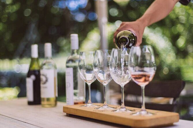 Full-Day Cape Winelands Tour - Franschhoek: Huguenot heritage, town strolls, and the open-air Wine Tram
