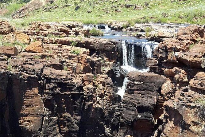 Full-Day Panorama Tour from Hazyview - Graskop and the Three Rondavels vibe: town breaks and icon views