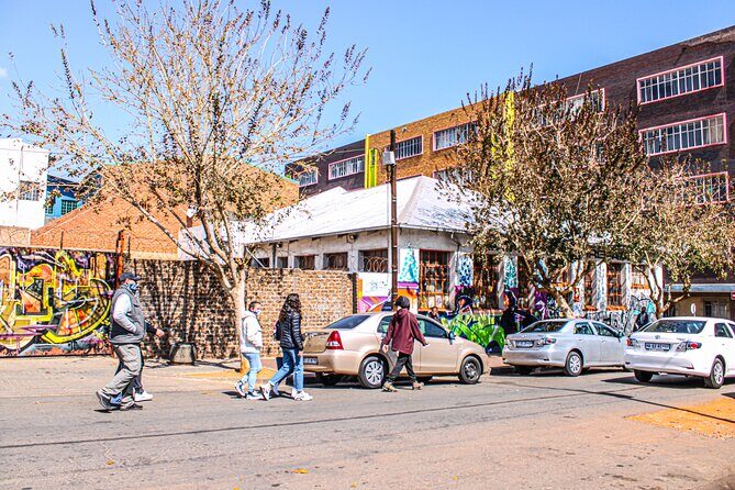 Johannesburg: Downtown Walking Tour Including Ponte City building - Stop 2: Hillbrow Tower and what apartheid-era housing looks like from street level