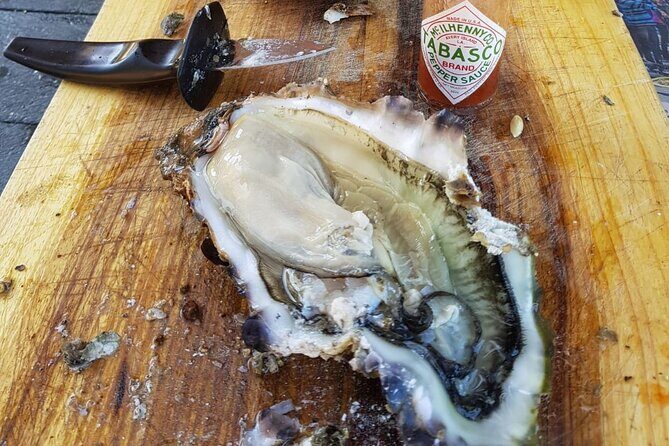 Knysna Oyster Tour - The Included Oyster Tasting and Local White Wine Pairing
