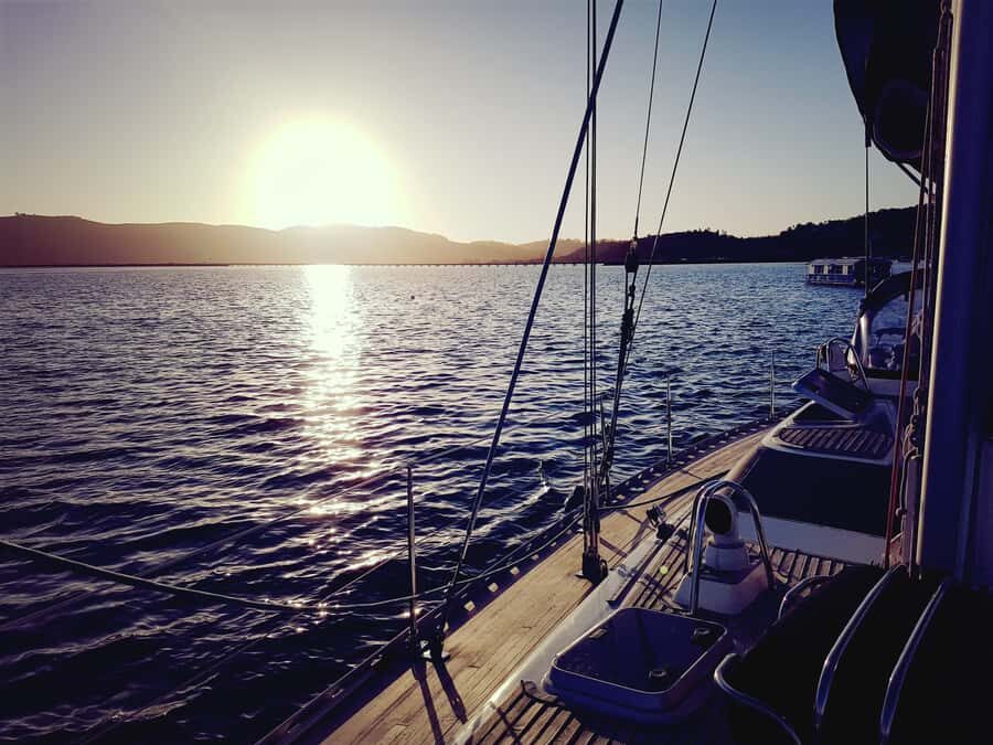 Knysna Sunset Sailing Cruise with Light Dinner and Wine - Hands-on classic sailing: crew skills and the vibe onboard