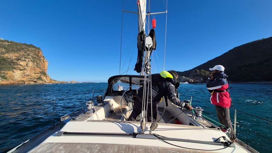 Knysna Sunset Sailing Cruise with Light Dinner and Wine - Comfort rules that matter: shoes, socks, and jackets