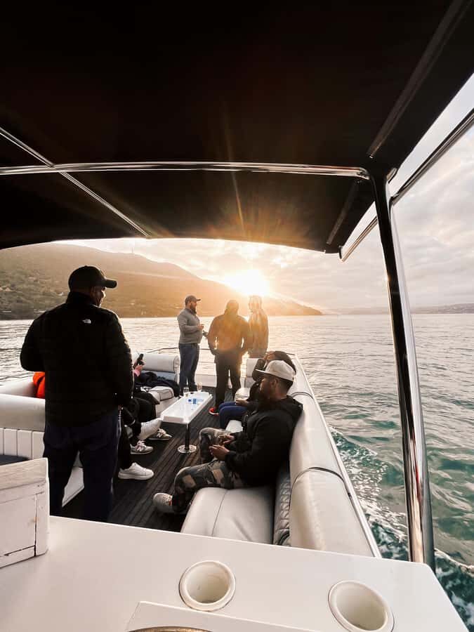 Knysna: Wine & Oyster Luxury Lounger Sunset Cruise - What to bring so the cruise feels comfortable, not annoying