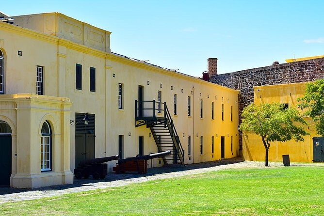 Nelson Mandela's Robben Island Prison Museum Cape Town City Tour + Ferry Tickets - Inside Robben Island Prison Museum: 18 years, confinement, and the guide-led experience