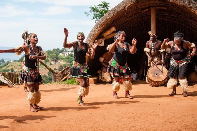 Phezulu Cultural Village & Reptile Park Day Tour from Durban - Inside the Zulu cultural village: huts, rituals, and a sangoma meeting