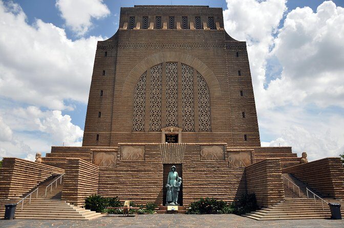 Pretoria Sightseeing Day Trip from Johannesburg - Getting to Pretoria: hotel pickup, air-conditioned ride, and what the guide sets up