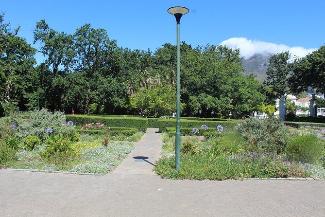 Private City Tour Table Mountain + Cable Car Ticket Camps Bay H/D - Camps Bay Beach: Blue-Flag Shoreline with Table Mountain in View