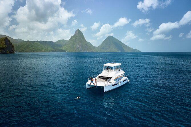 Private Full Day Luxury Catamaran Excursion - Marigot Bay: the first coastline chapter (and a great early photo window)