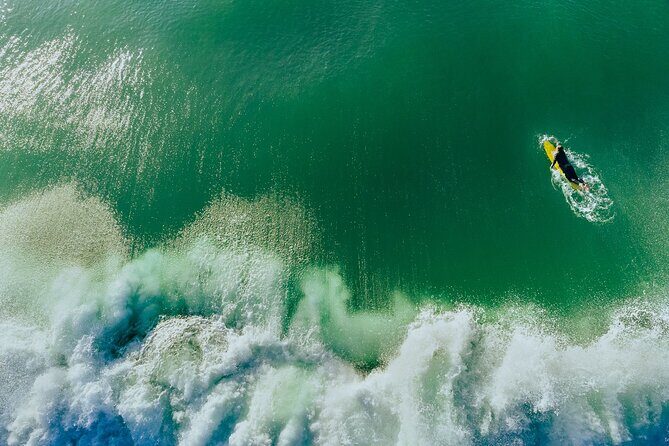 Private Surf Lesson in Cape Town – Transport & Photos Included - The gear setup: wetsuit, board, leash, and the towel trick