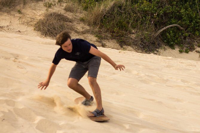 Sandboarding in Jeffreys Bay, South Africa - Standing vs. Sitting Boards: Picking Your Comfort Level