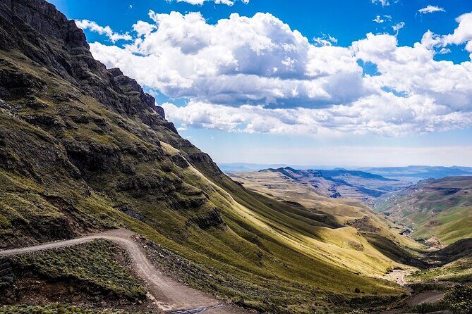 Sani Pass Tour into Lesotho from Underberg and Himeville - Basotho village visit: bread, beer, and learning daily life