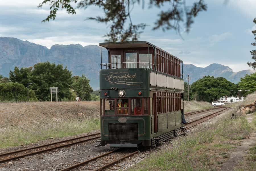 SCHEDULED FRANSCHHOEK WINE TRAM EXPERIENCE (by group size) - Wine tastings, tram fees, and where the costs add up