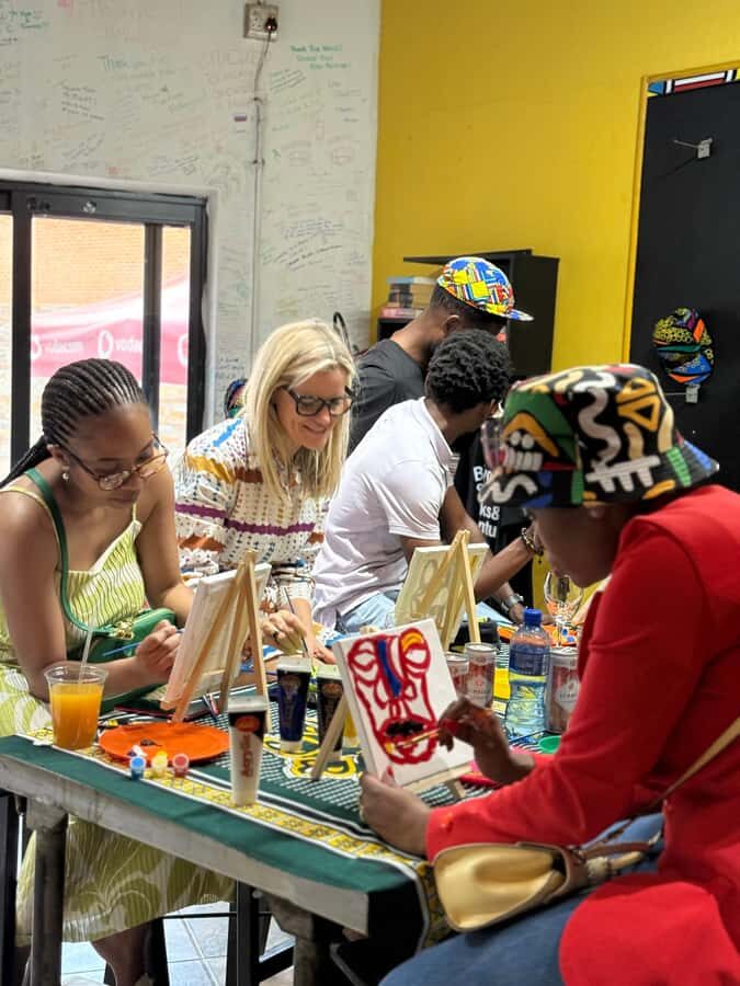Soweto: Sip & Paint Walking Tour & Take Home a Canvas - The Arts & Crafts Stop: African-Inspired Fashion and Community Upliftment