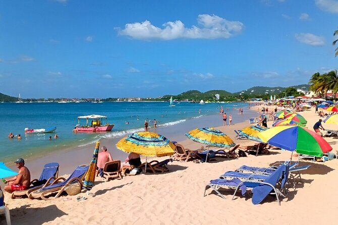 St. Lucia Beach Day with Paradise Beach Comforts & Transportation - Chairs, Umbrellas, and the Included Drink That Start Your Relaxation